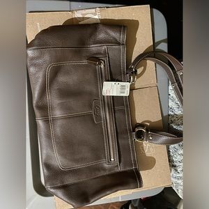 Brown coach purse.